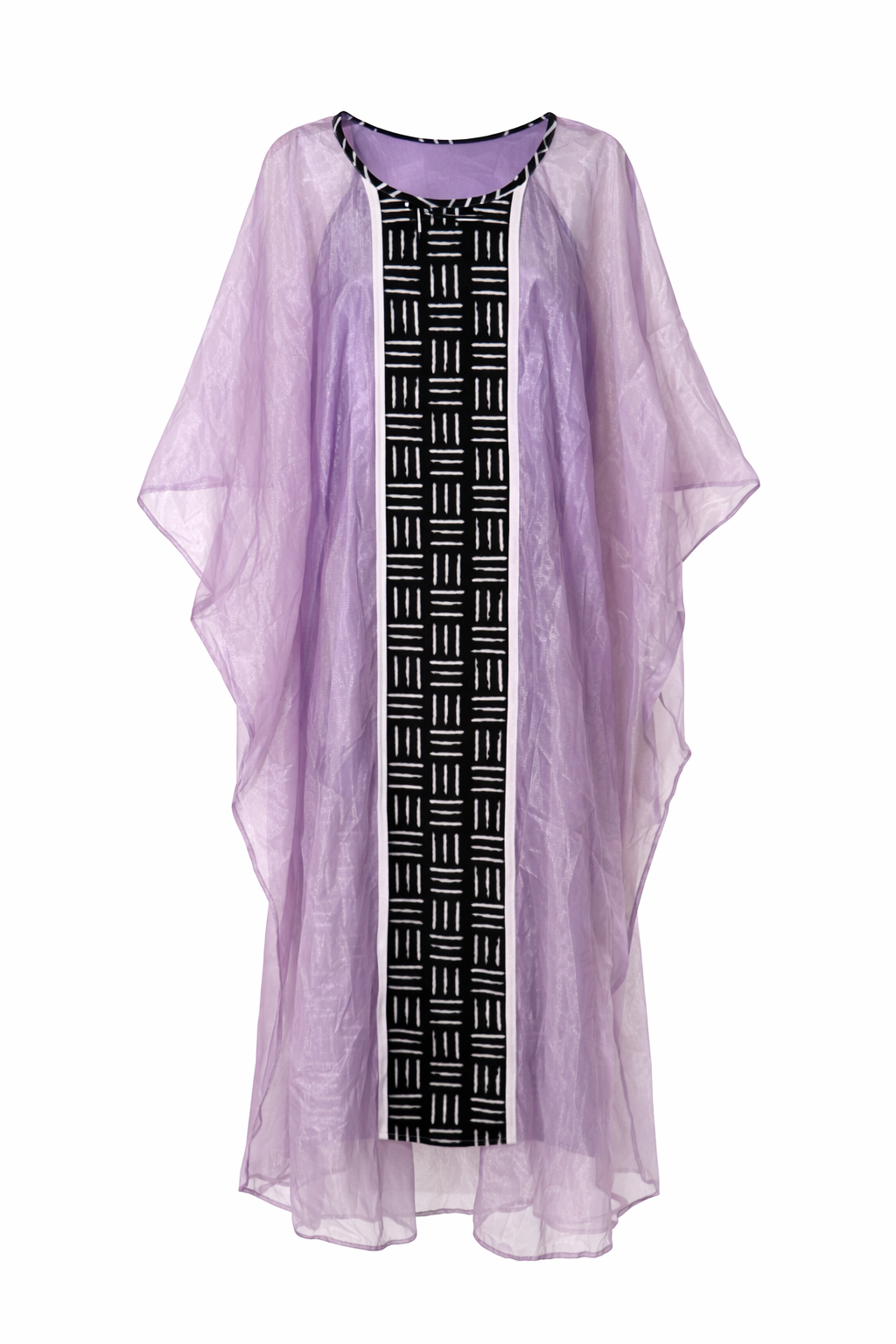 Lilac kimono-style garment over a black and white patterned dress on a white background