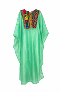 Green Kaftan with colorful embroidered neckline on a white background