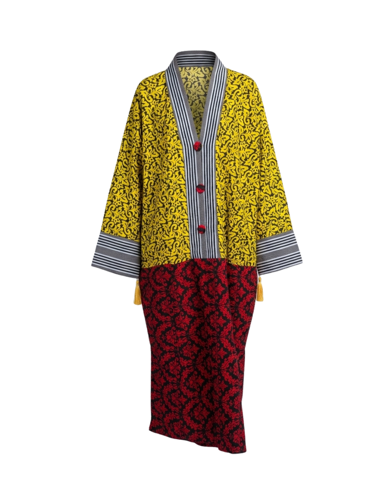 Yellow coat with black and white striped trim and red patterned skirt on a white background