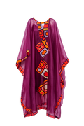 Purple kaftan with orange and red geometric pattern on a white background