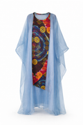 Light blue kaftan with a colorful patterned panel on a white background